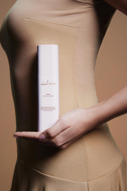 Women Holding Antati Oases Micellar Water product